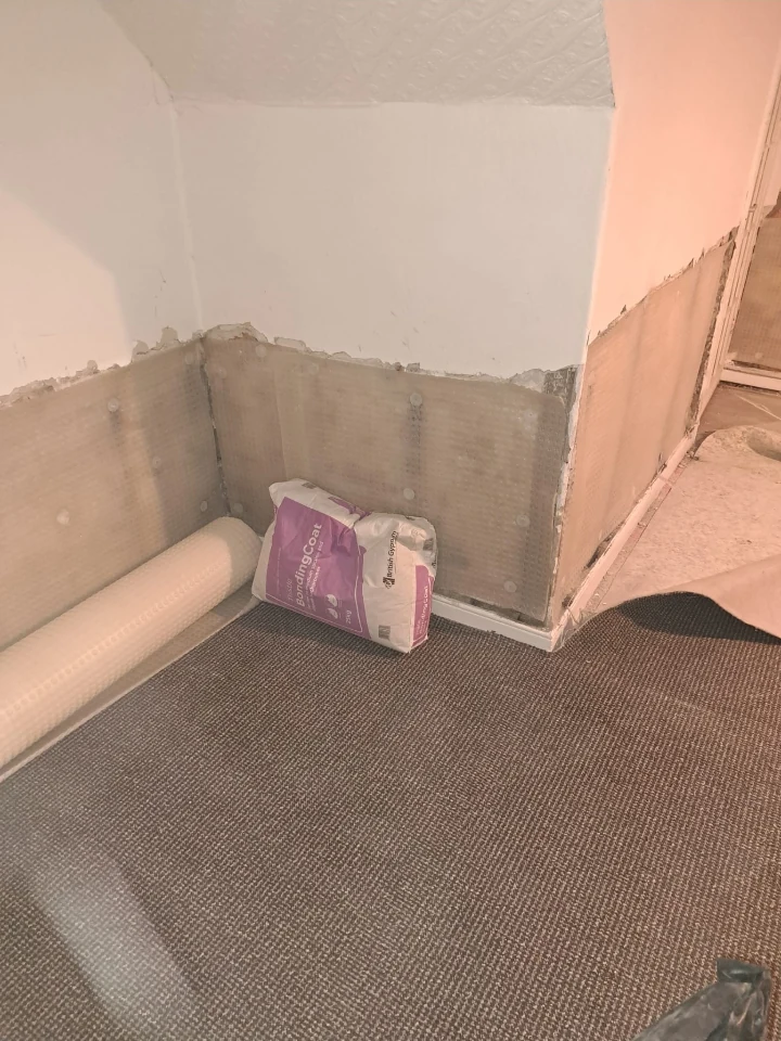 Corner junction of cavity-drain membrane sealed and ready for the drainage channel in a Newcastle basement