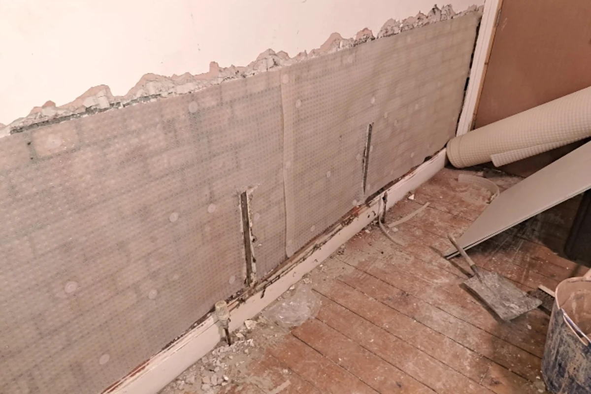 Damp proof membrane fitted to a lower wall in Newcastle