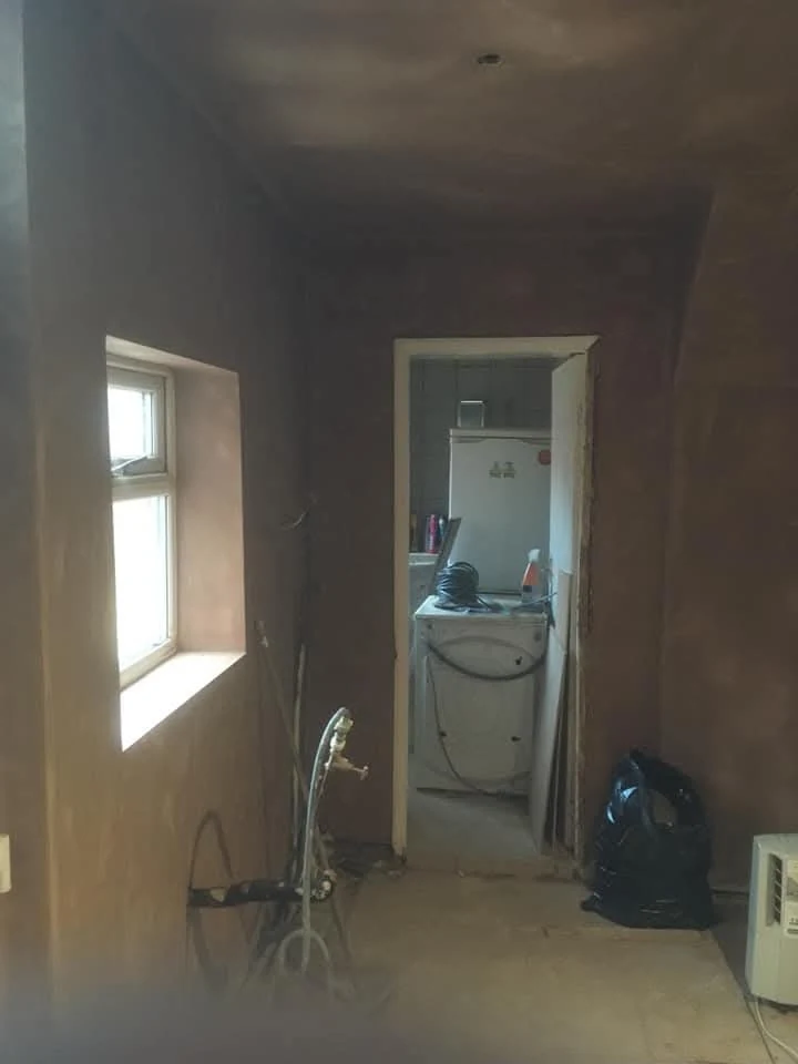 Damp proofing work in progress on a Newcastle hallway