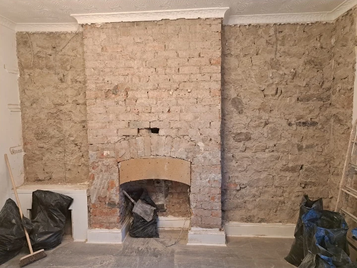 Damp survey strip-out on a Newcastle chimney breast by Newcastle Barrier Damp Proofing