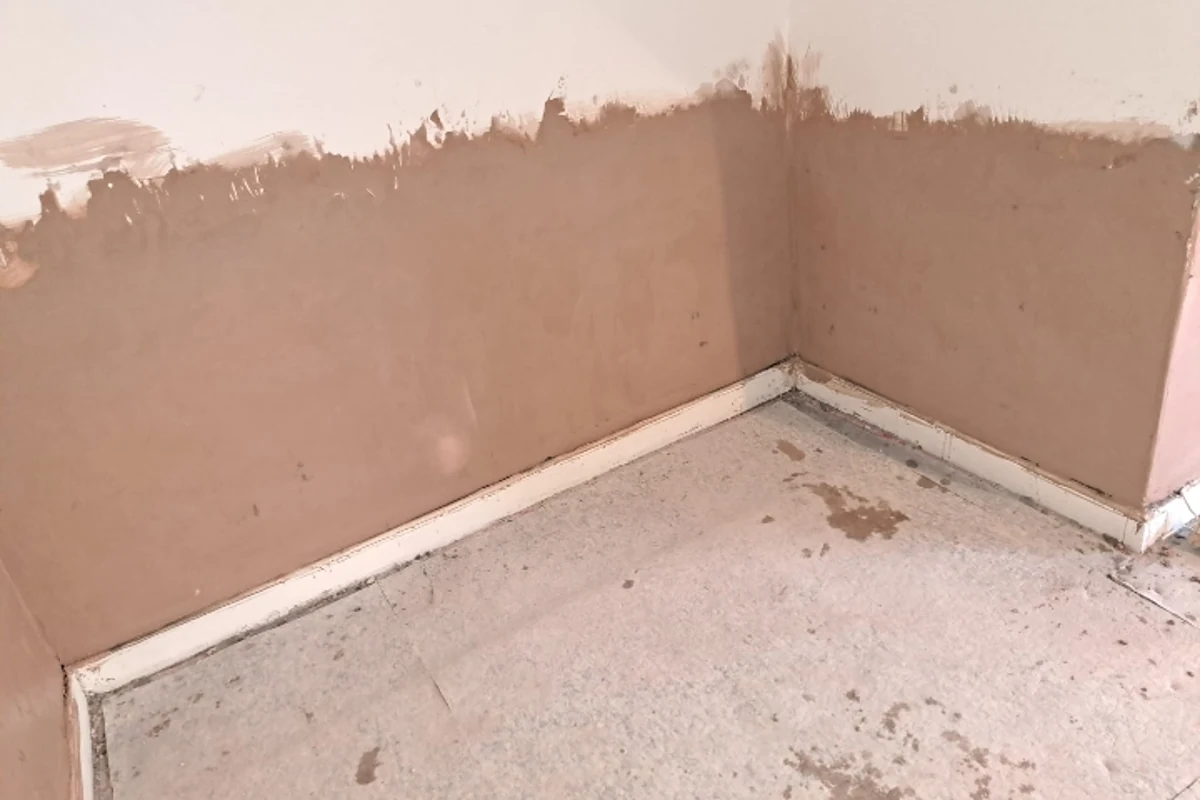 Damp proofing work at a wall corner in Newcastle