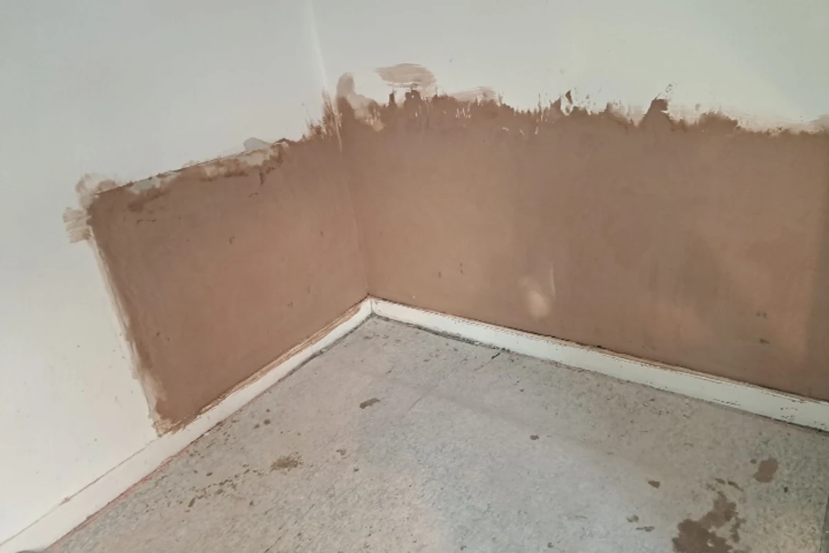 Replastering in progress after rising damp treatment on a Newcastle property
