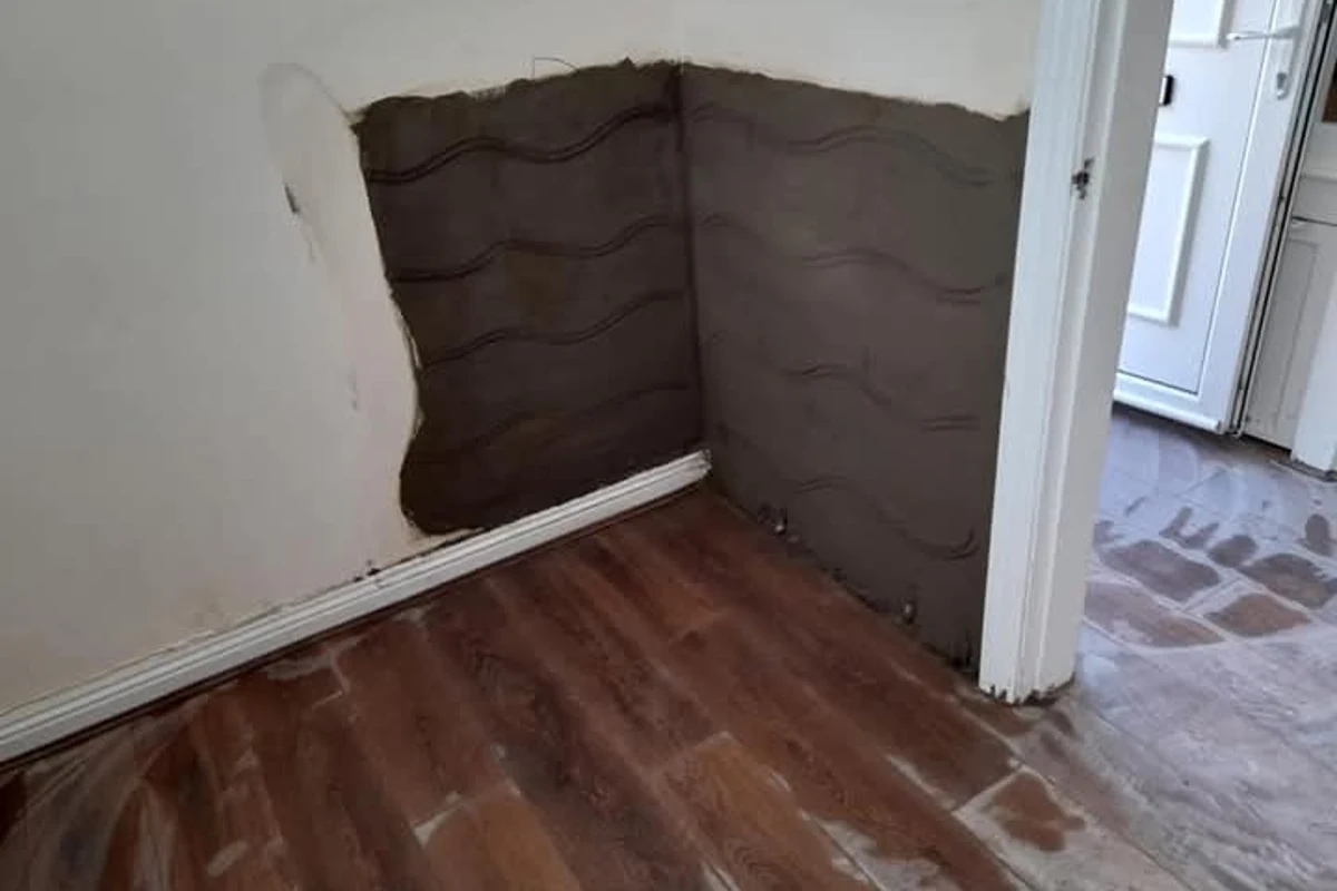 Waterproof render applied to cellar walls as part of cementitious tanking in Newcastle